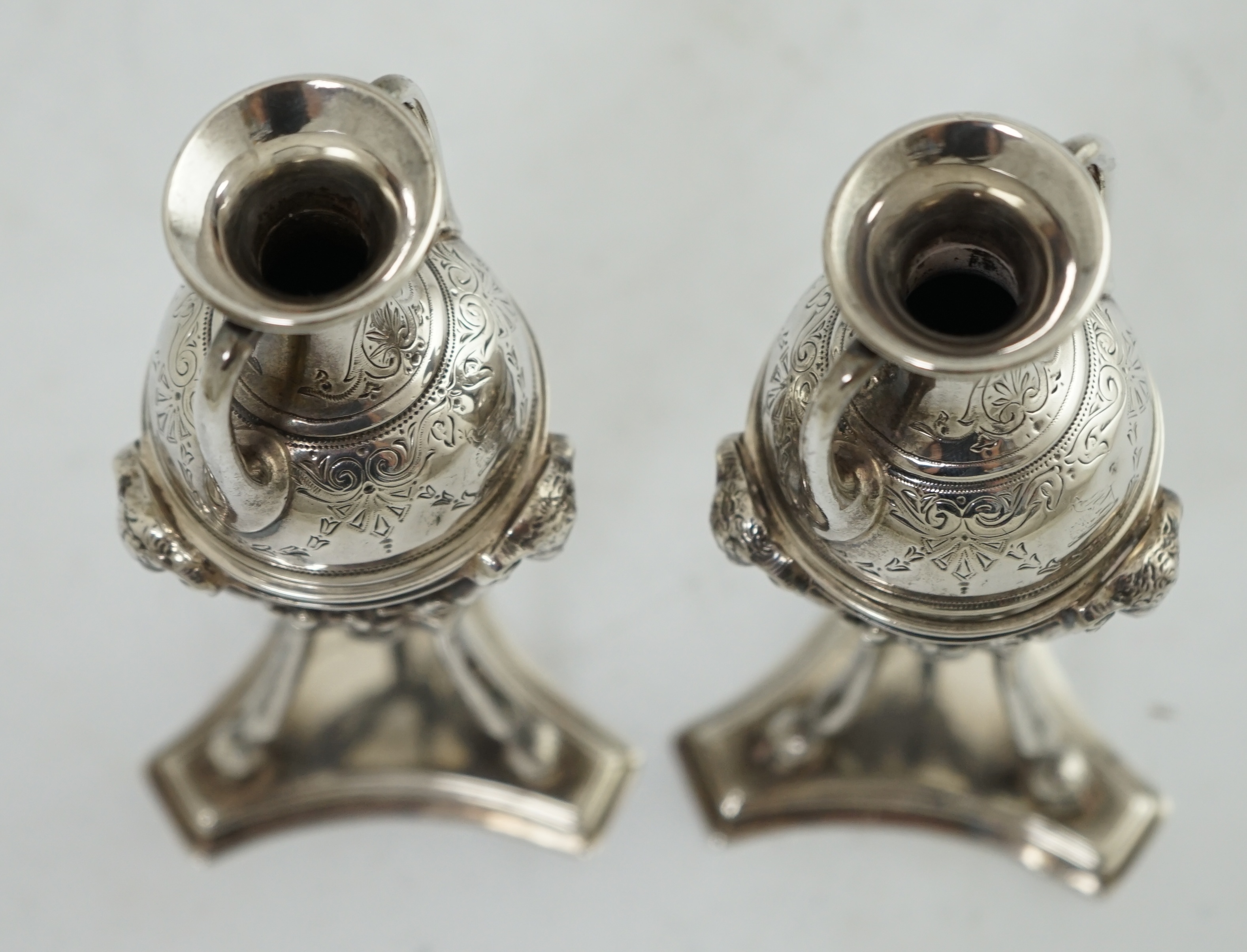 A pair of Victorian silver miniature urns on stands, by William & John Barnard